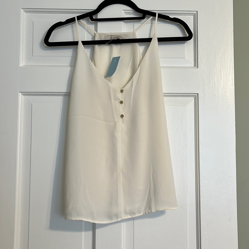 Loft cream colored tank top with gold button detailing. Size Small petite.